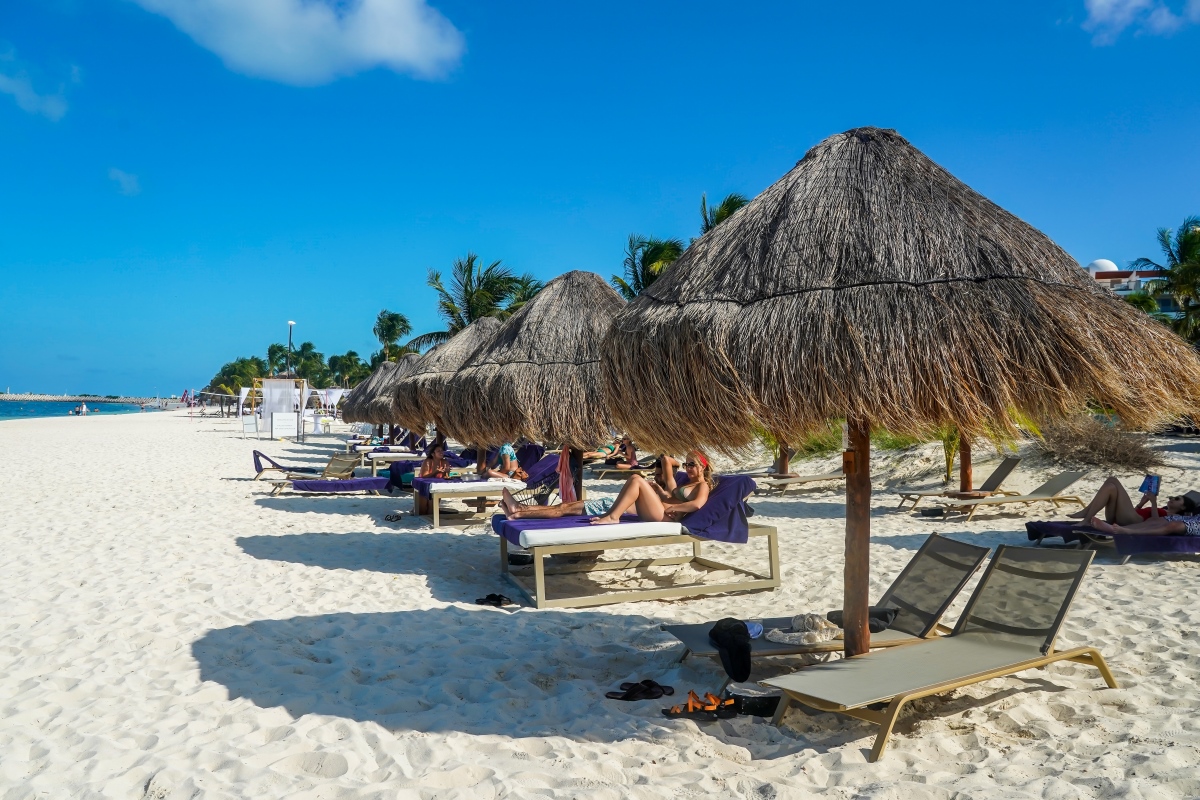 Tourists relax at the beach at Finest Playa Mujeres Resort in Cancun, Mexico