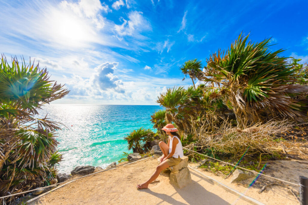 Tourist in Tulum, Mexico Enjoying the View of the Mexican Caribbean