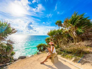 Tourist in Tulum, Mexico Enjoying the View of the Mexican Caribbean