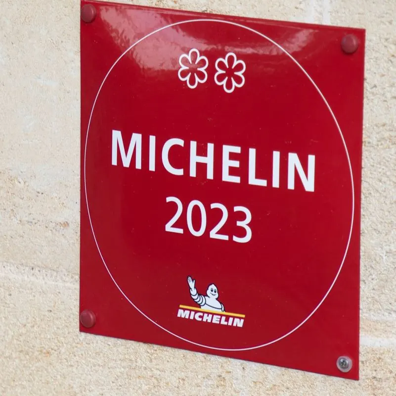 A michelin star plaque on a restaurant wall