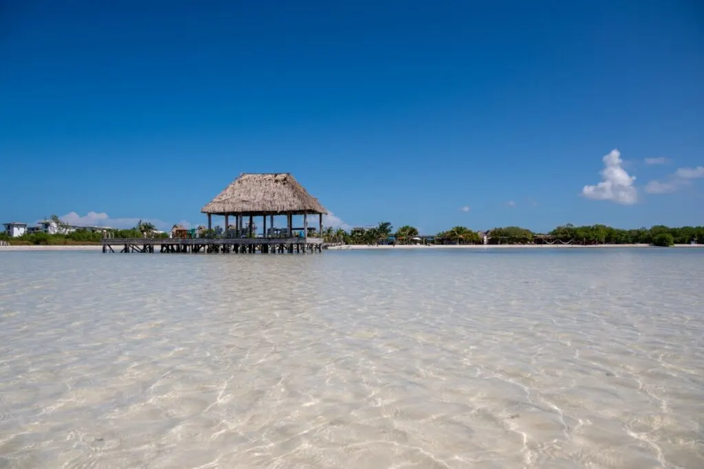 Wooden hut in the water on the beach of the paradisiacal island of Holbox in Mexico