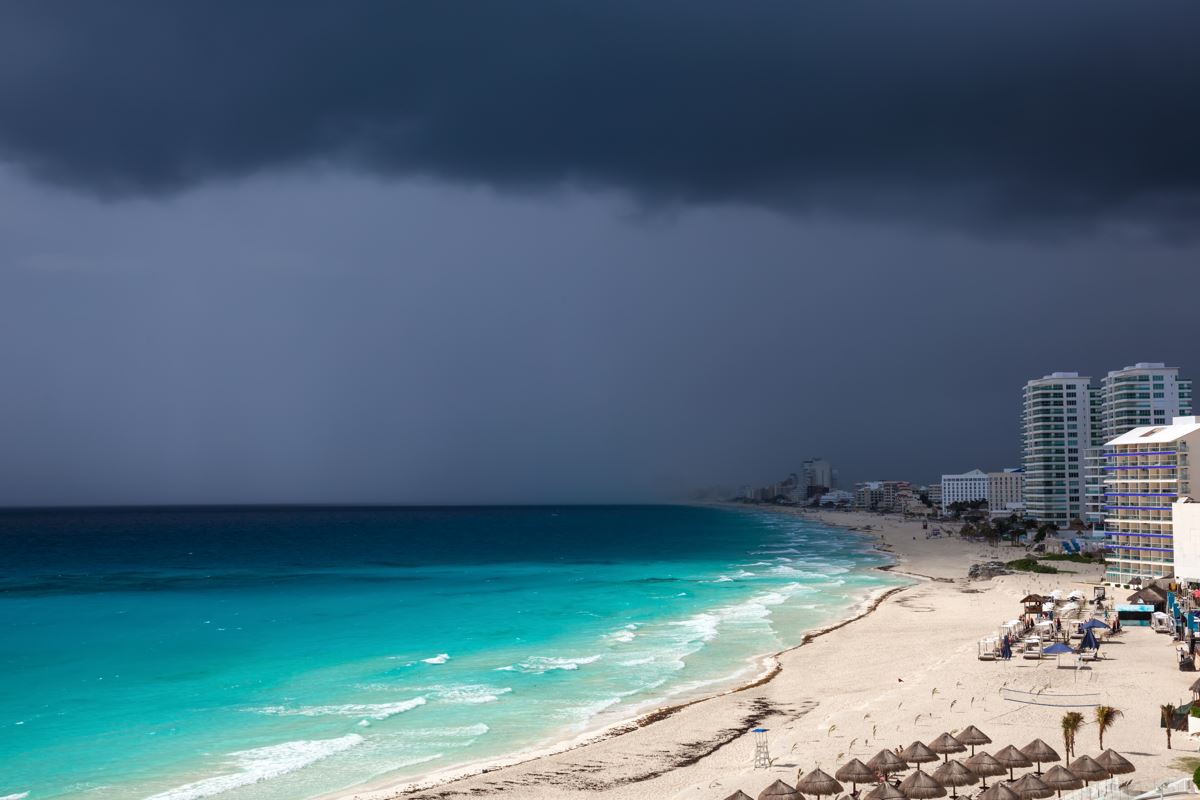 A view of dark storm clouds above cancuns hotel zone