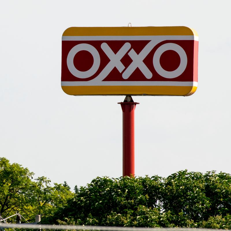 An oxxo convenience store sign