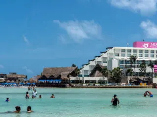 tourists enjoying ocean in Isla Mujeres