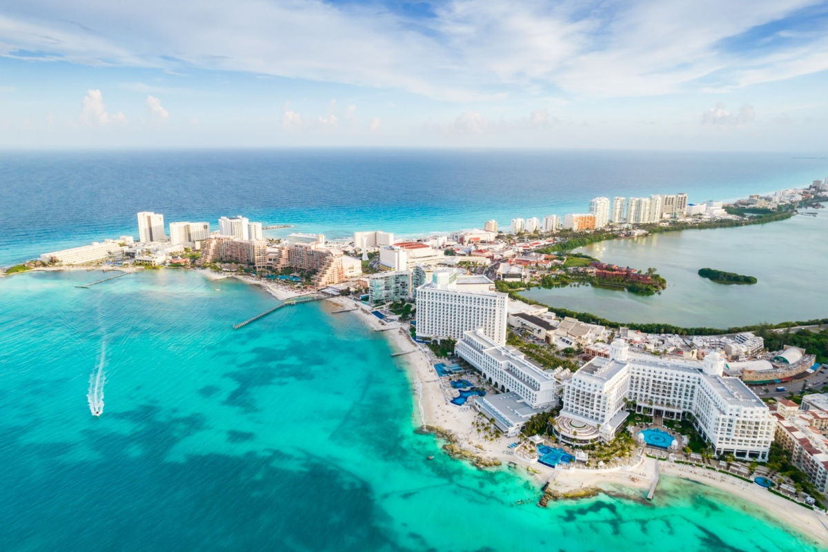 aerial view of cancun's resort area with blue water