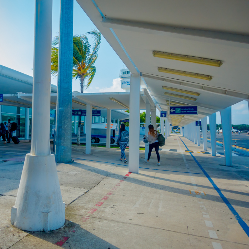 Travelers Outside of Cozumel Airport