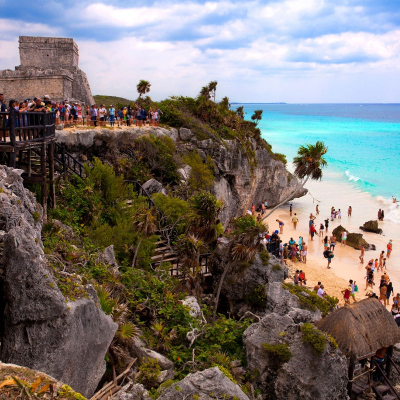 A crowded beach in Tulum national park