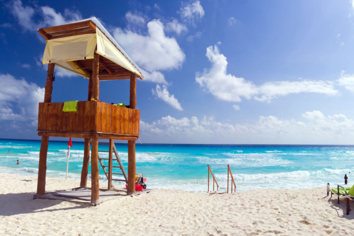 A beach tower in a cancun beach with hot weather