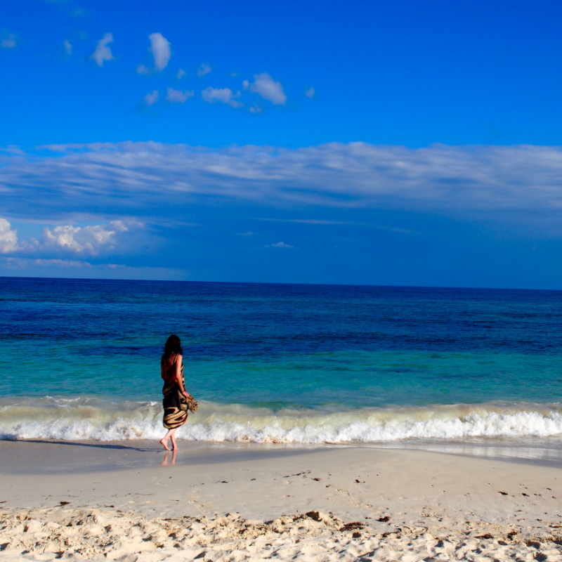 Woman on a Secluded Beach in Puerto Morelos, Mexico