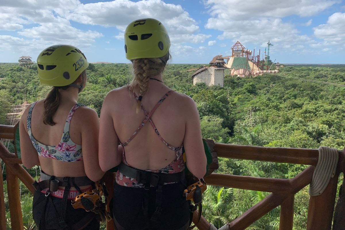 Two tourists wait for the zip line at Xplor by Xcaret.