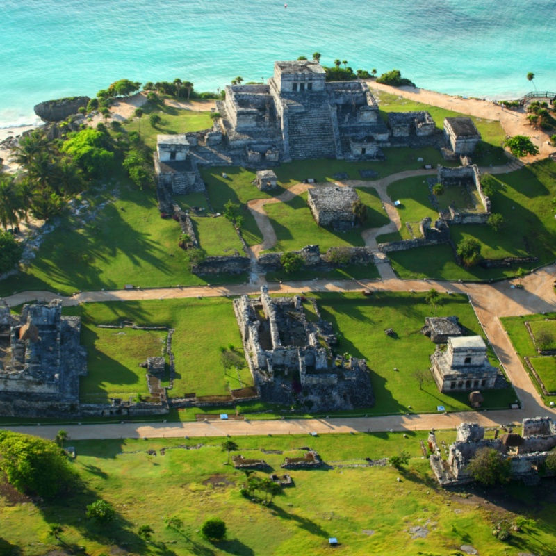 tulum's archeological zone with blue water