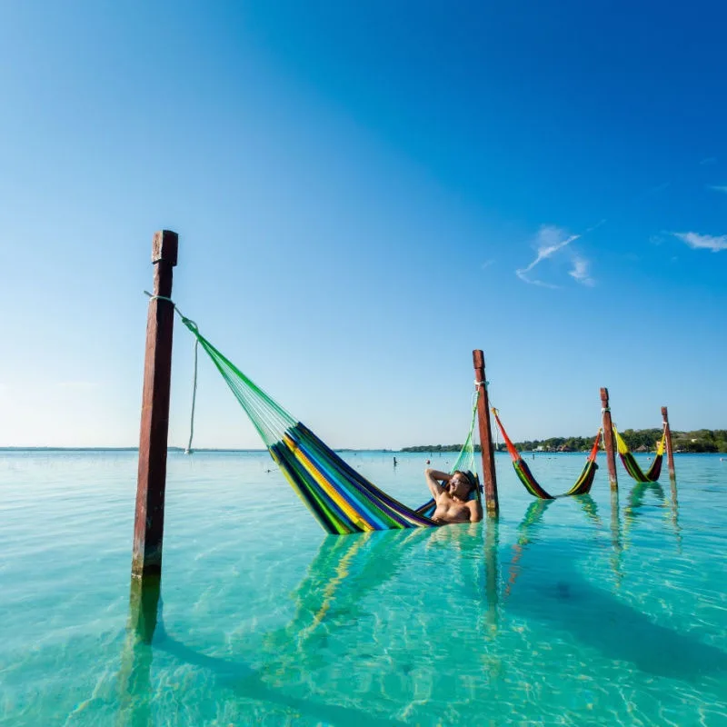 a relaxing area in bacalar with female traveler