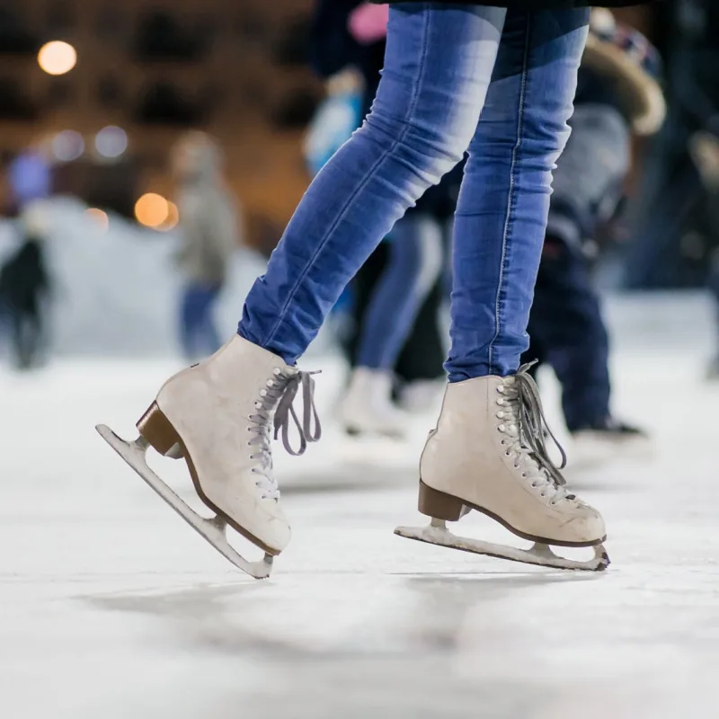 Person Ice Skating on an Ice Skating Rink