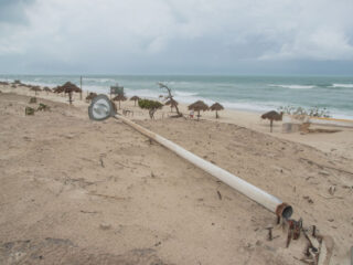 a beach in cancun after a hurricane