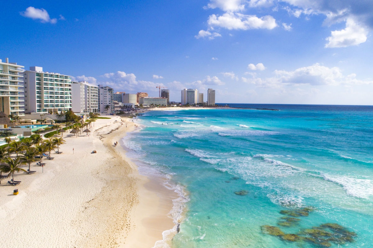 panoramic view of cancun's resort zone and a white sand beach 