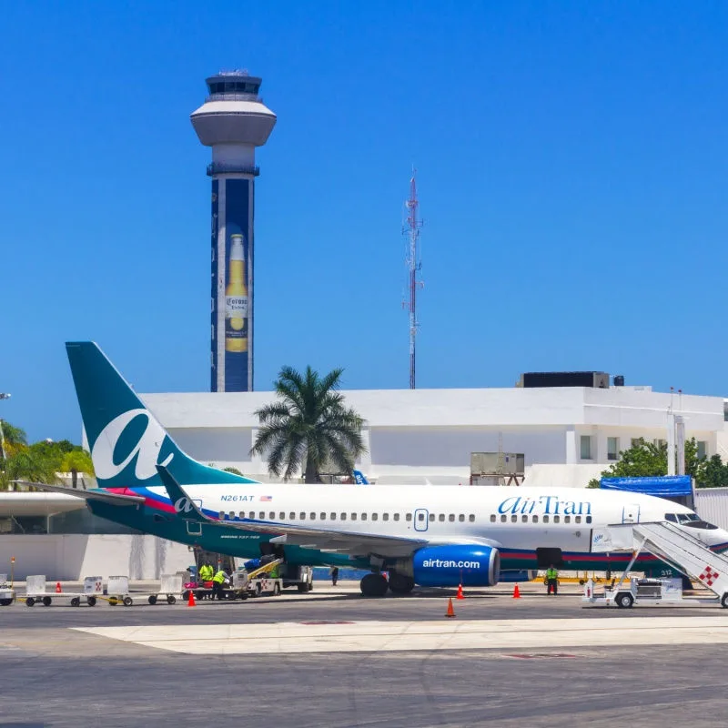 cancun international airport with airplanes