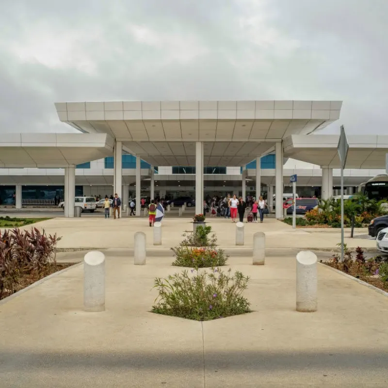 outside view of the cancun airport with taxis