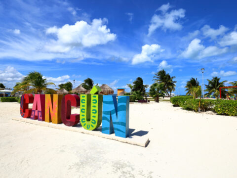 Colorful Cancun Sign on a Beach in Cancun, Mexico