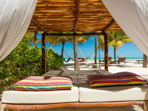 Hammocks and Daybeds on a Sargassum Free Beach on the Beautiful Island of Holbox, Mexico