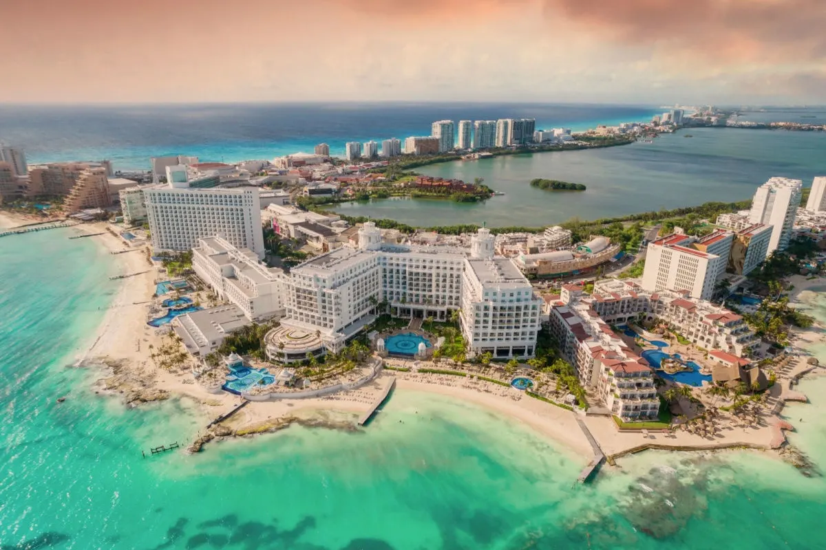aerial view of cancun's resort zone with bkue water