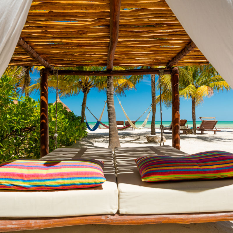 Hammocks and Daybeds on a Sargassum Free Beach on the Beautiful Island of Holbox, Mexico
