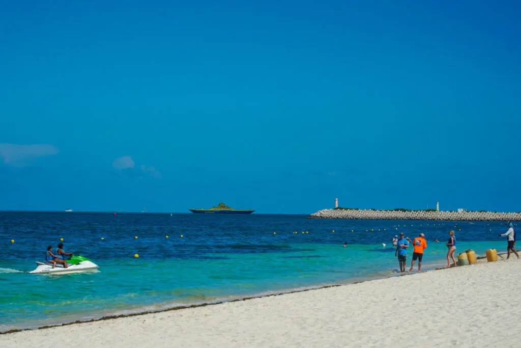 Tourists on a Beach in Playa Mujeres Cancun, Mexico on a Summer Day