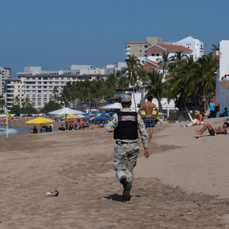 a law enforcement officer patroling in cancun