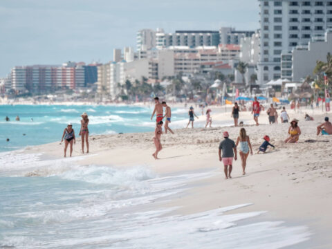 Happy Beachgoers on a Beautiful Cancun Beach