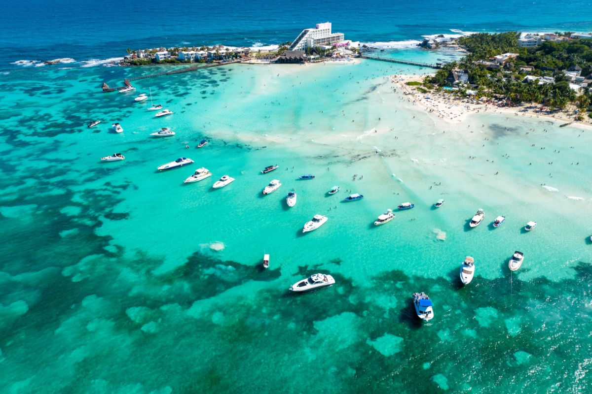 aerial view of a white sand beach in isla mujeres 