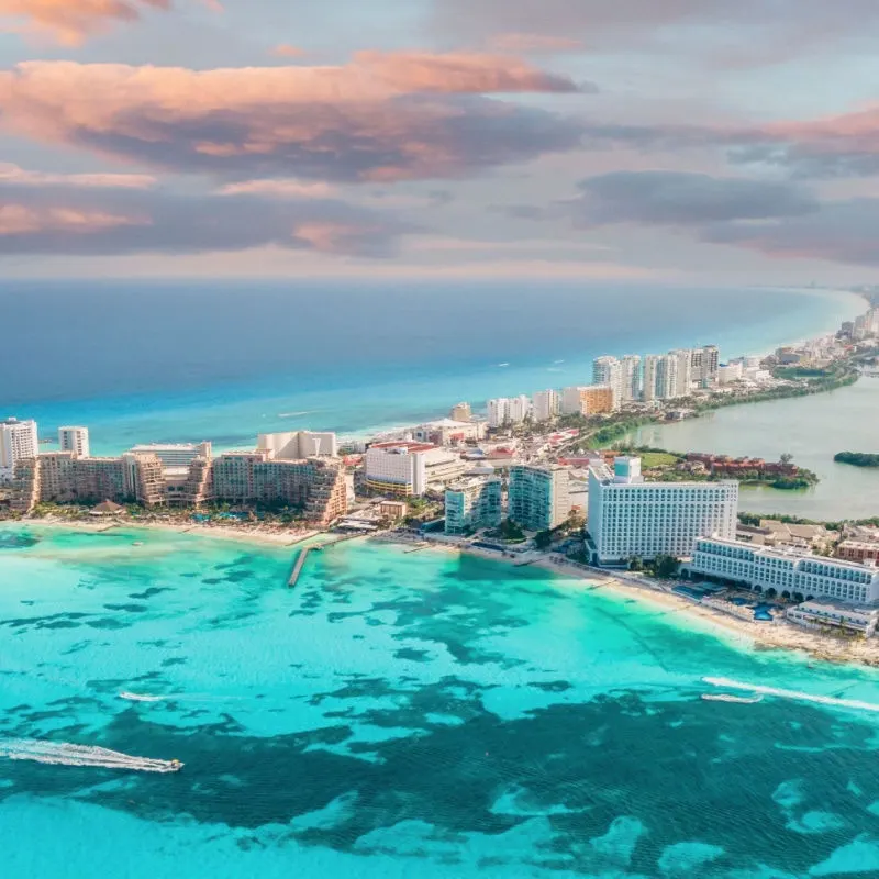 cancun's colorful resort zone at night 