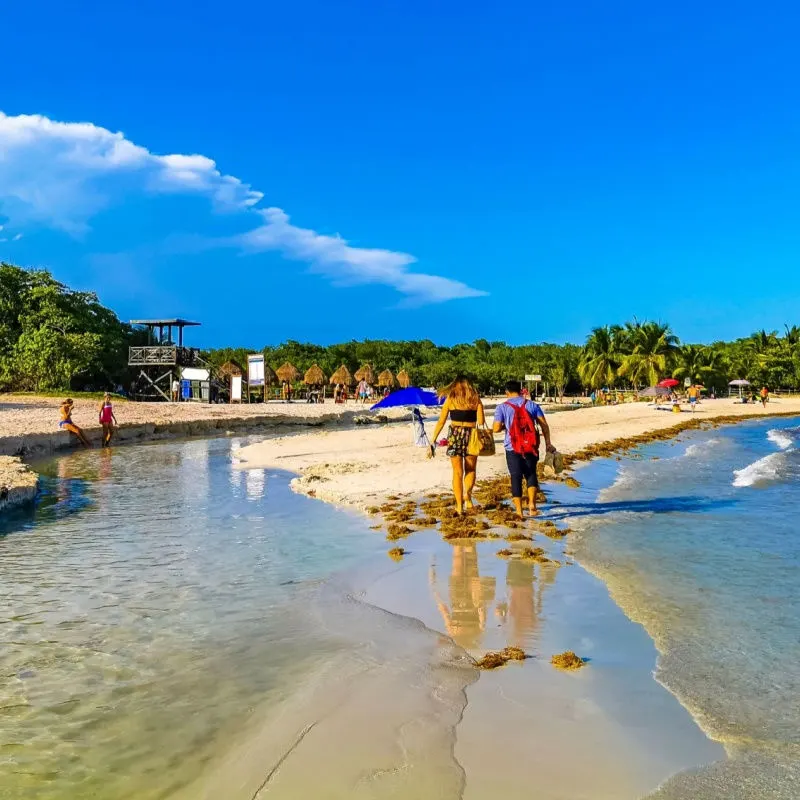 water filling up a beach in playa del carmen 