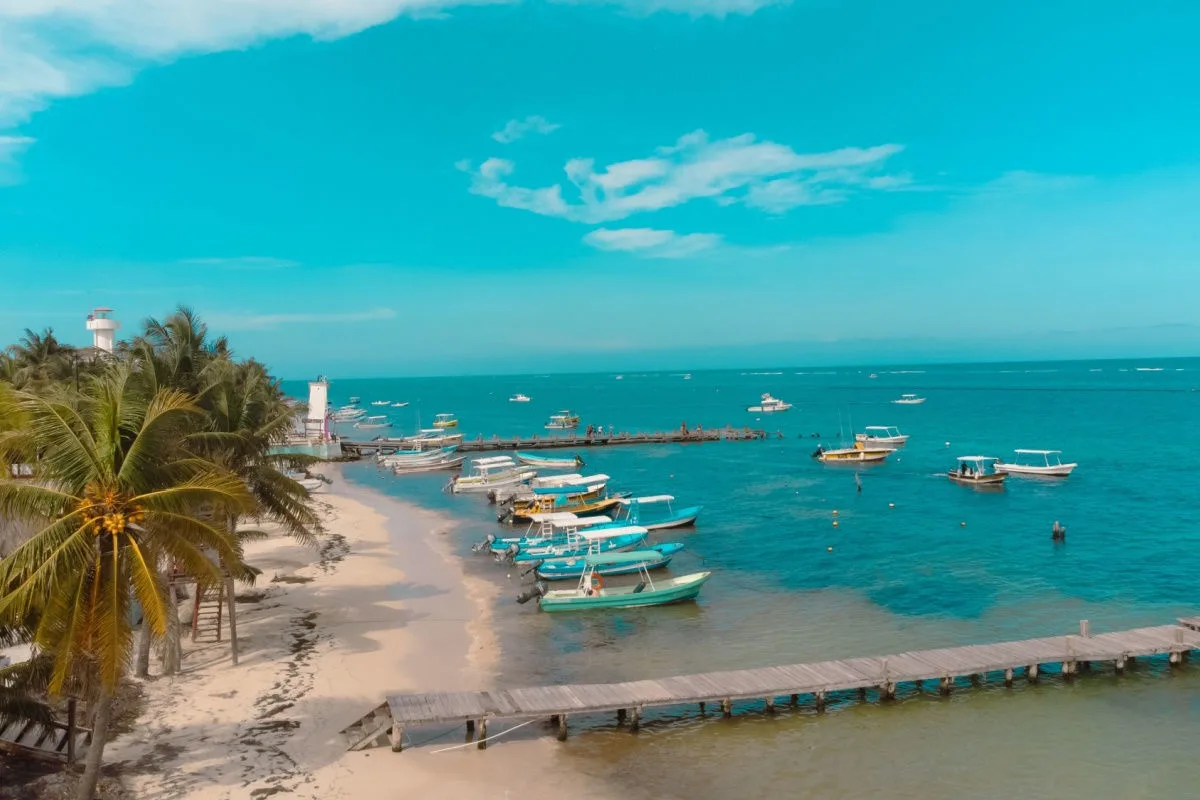 a white sand beach in puerto morelos