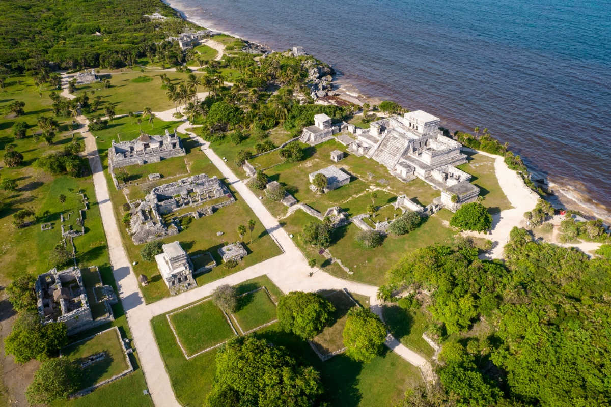 aerial view of the tulum mayan ruins with sea