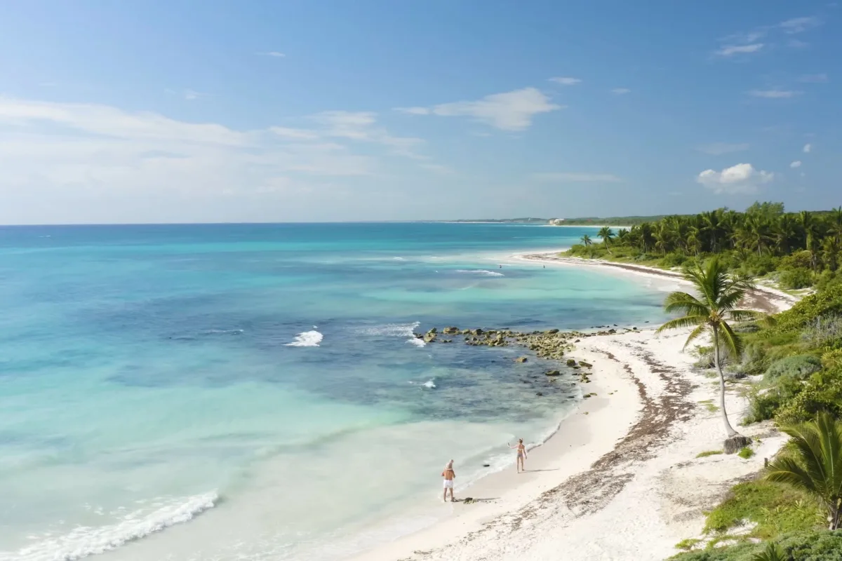 aerial view of a long white sand beach mexican caribbean