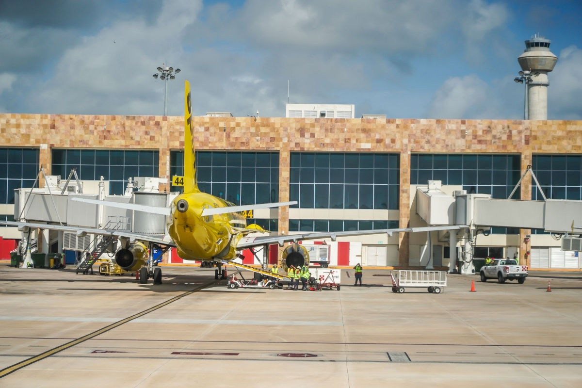 outside view of the large terminal in cancun airport