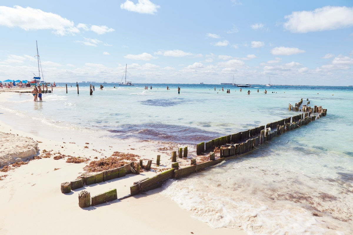 a white sand beach in isla mujeres