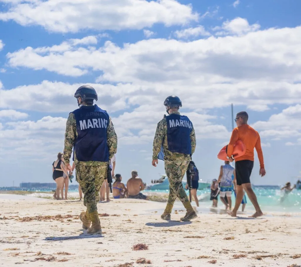 Cancun Marines and life guard patrol beach