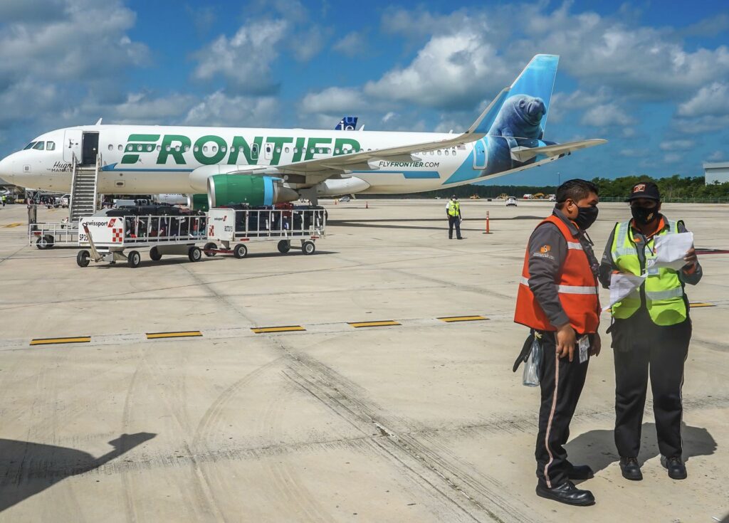 Frontier plane lands at Cancun airport