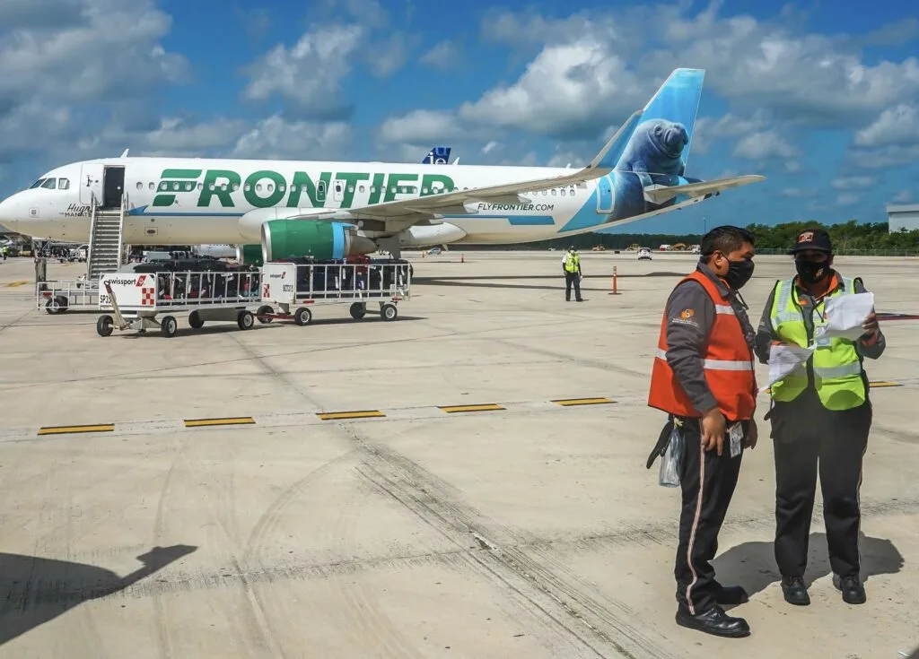 Frontier plane lands at Cancun airport