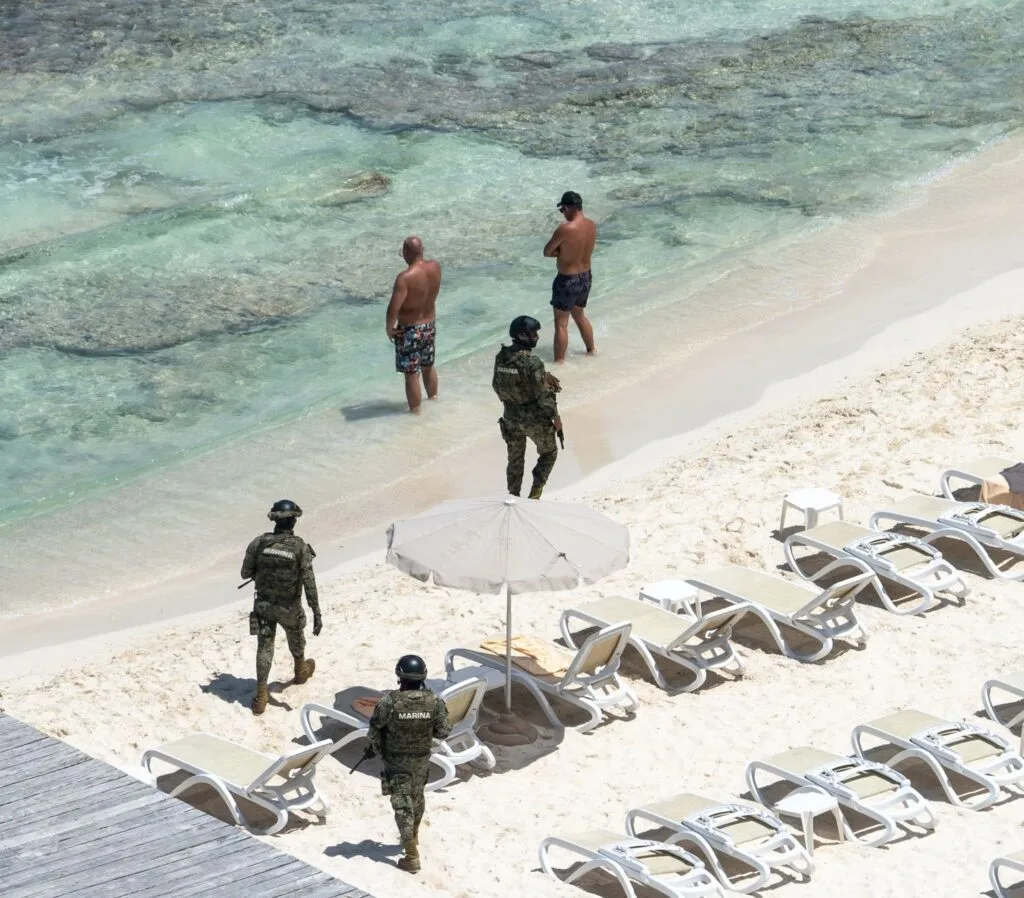 Cancun police and military on beach