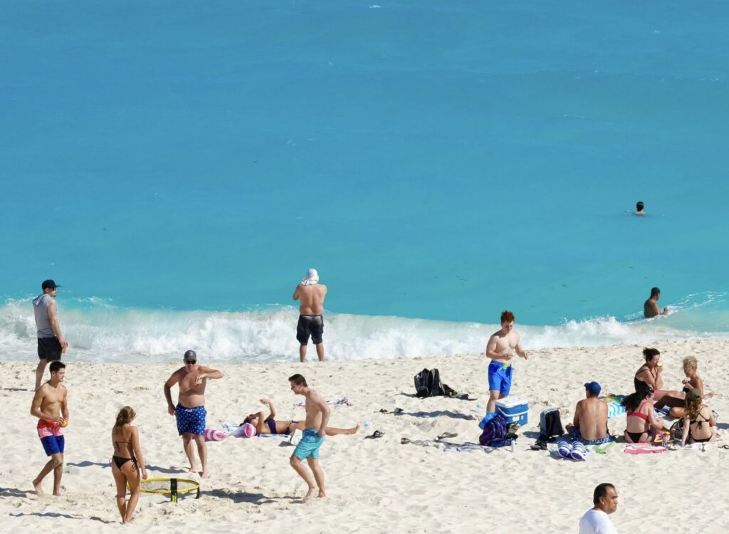 Tourists on cancun beach