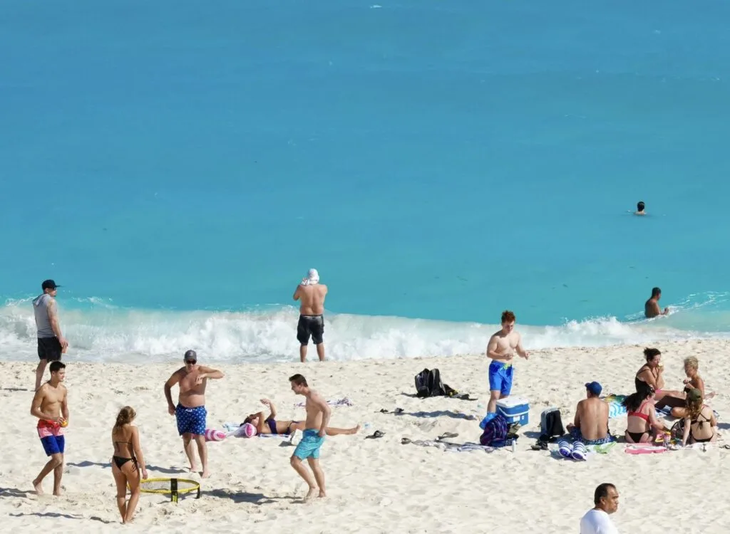 Tourists on cancun beach