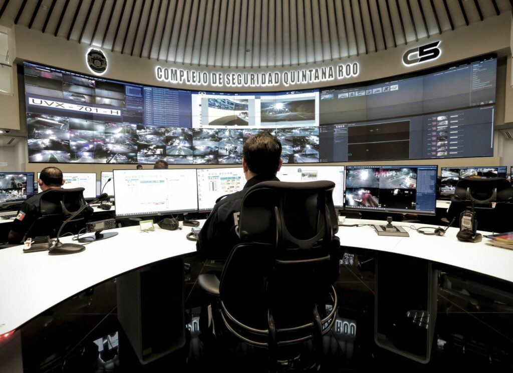 Officer monitors Cancun high tech cameras