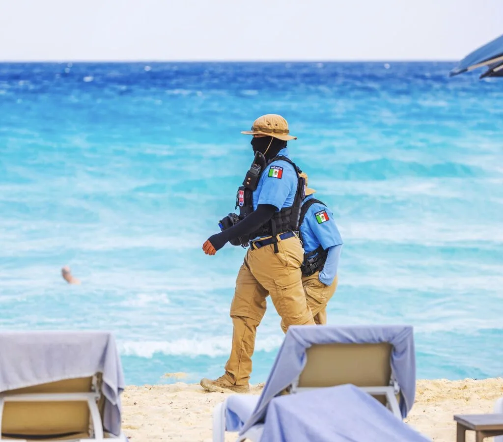 Police cancun beach