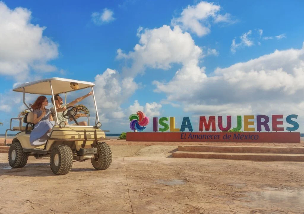 Isla Mujeres Sign and golf cart