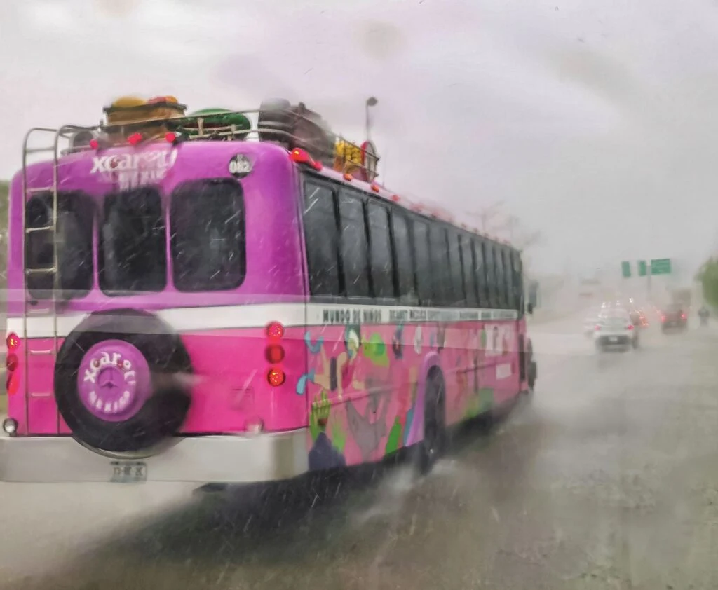 Bus driving in rain Cancun
