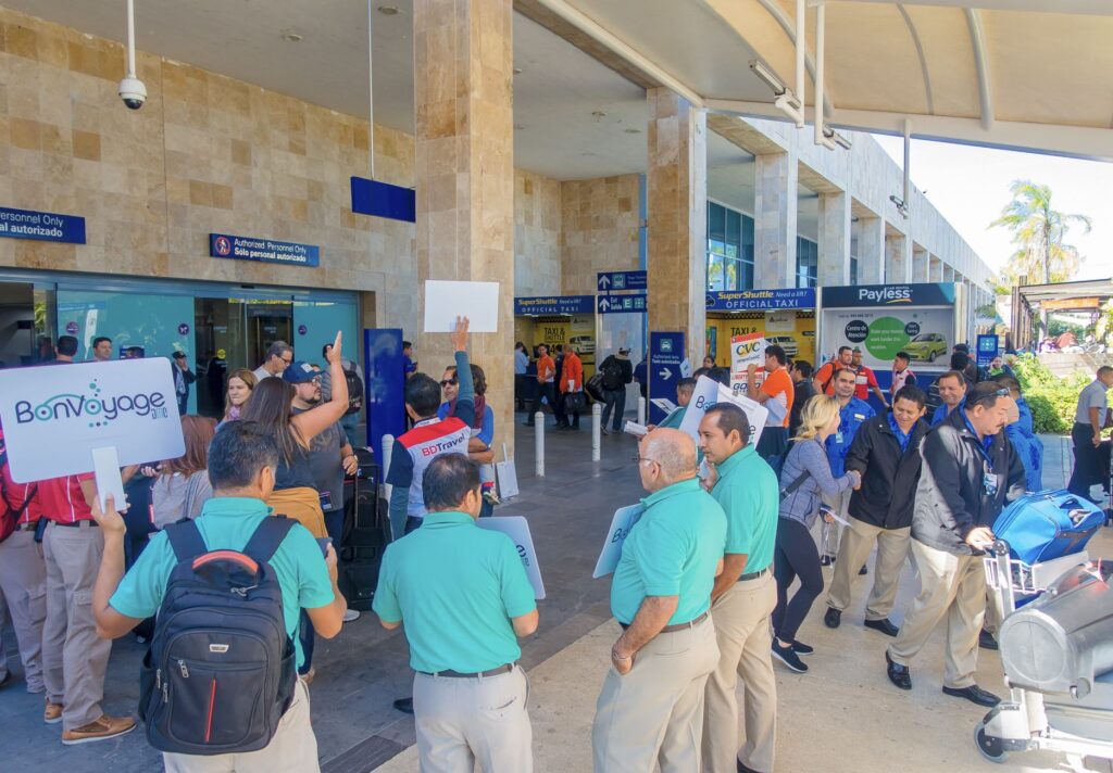 TOur drivers wait for passengers outside cancun airporta