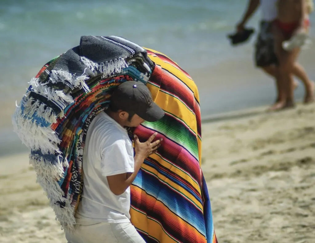 Cancun beach vendor blankets