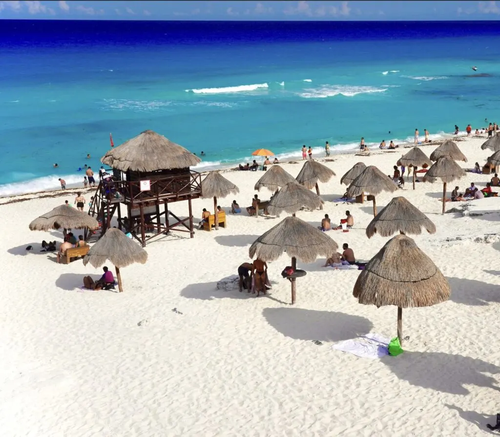 Tourists on beach in Cancun