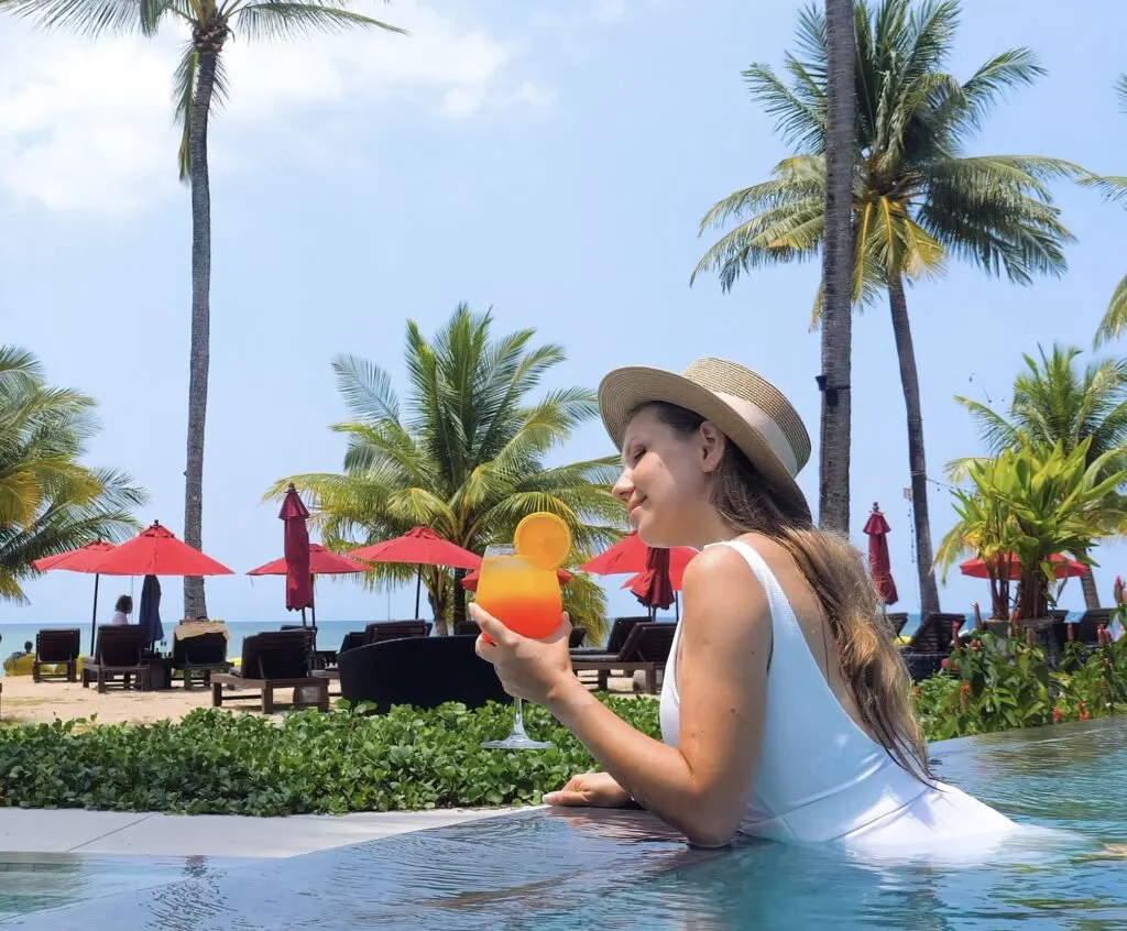 Woman in pool Mocktail